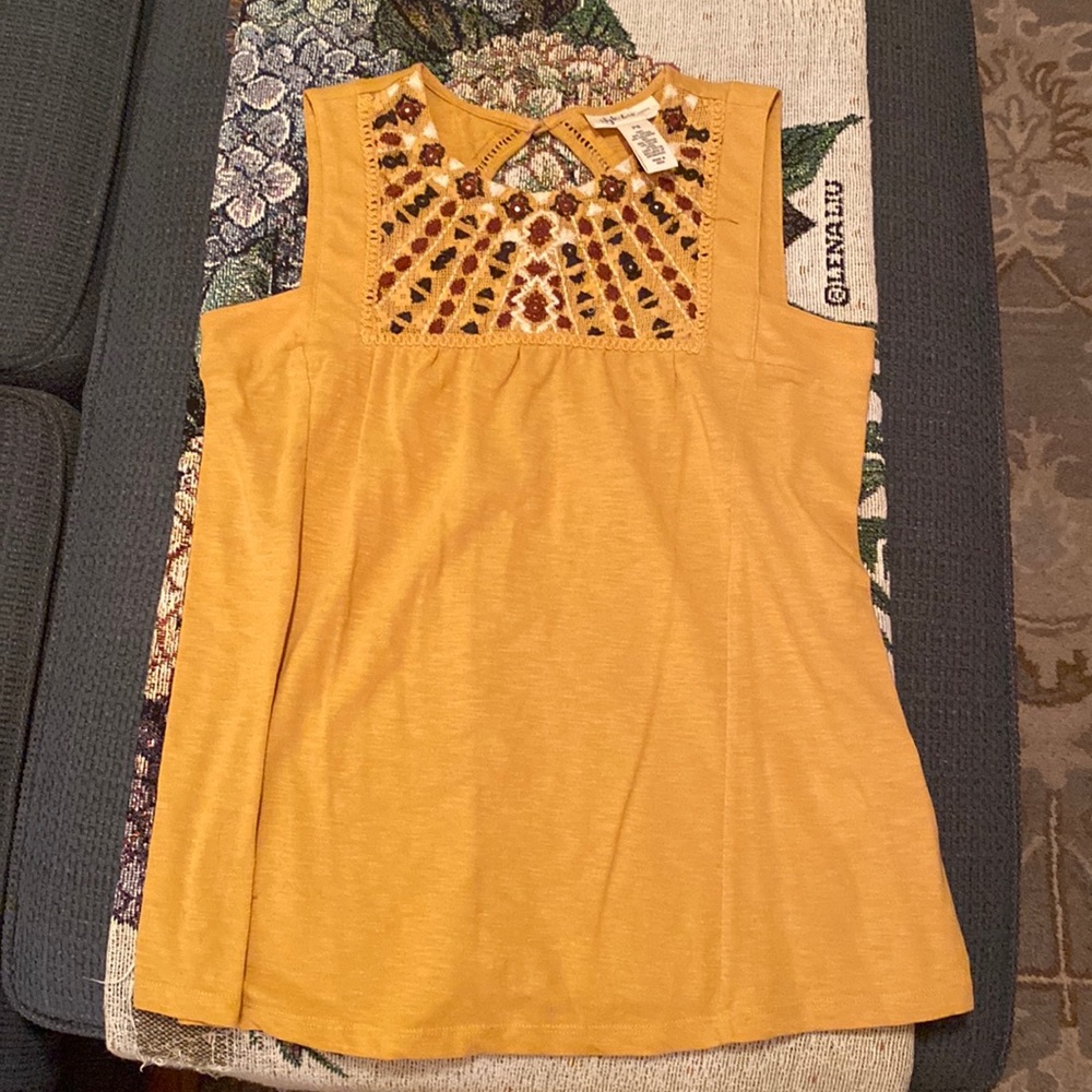 Sleeveless orange shirt